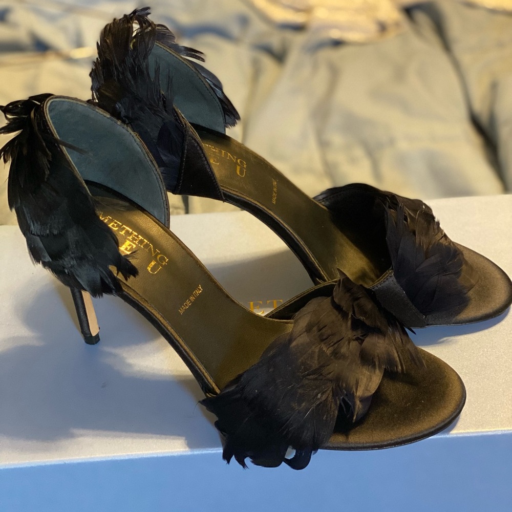 Something Bleu Black Feather Heels. Never worn. In original box and packing.